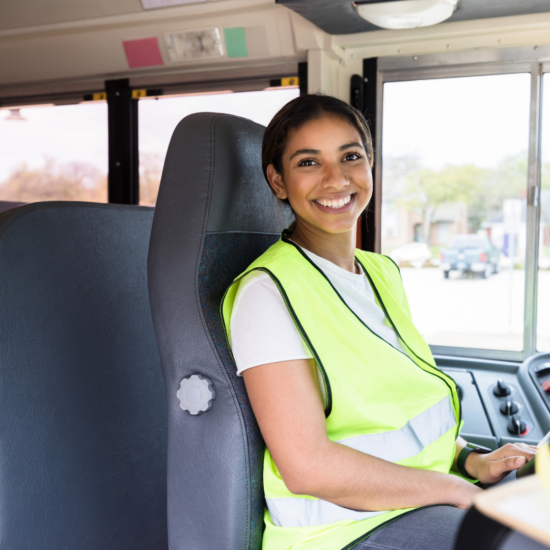 Commercial driver ensuring safety on the road, part of AMT Insurance Solutions' guide to keeping drivers safe and reducing insurance premiums