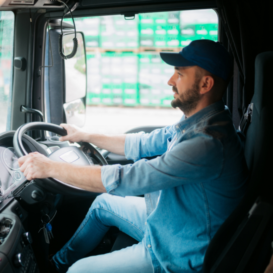 Fleet of commercial vehicles representing further tips on driver safety and insurance premium reduction by AMT Insurance Solutions.