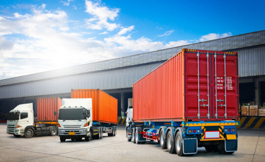 Logistics vehicles representing specialized Transportation & Logistics Insurance coverage.